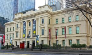 a building with banners on the front