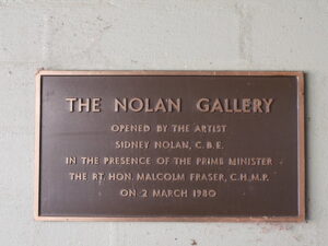 The Nolan Gallery plaque, marking the official opening by Sidney Nolan in the presence of the Prime Minister in 1980