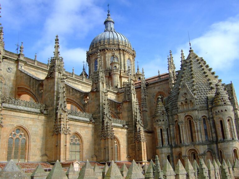 Salamanca Place Architecture: "A close-up view of the intricate architecture of Salamanca Place, showcasing the gothic design and tall spires