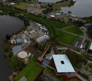 Aerial view of Museum of Old and New Art (MONA) with construction site, vineyard, and waterway