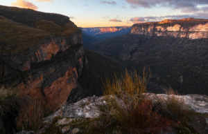 Scenic landscape of Arnhem Land plateau, with cliffs and lush valleys, capturing the majestic beauty of Australia's wilderness